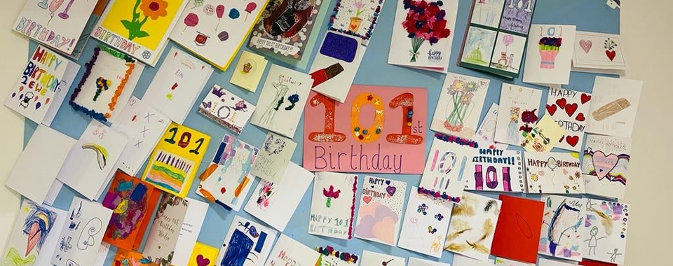 Children make birthday cards for Gladys’ 101st birthday